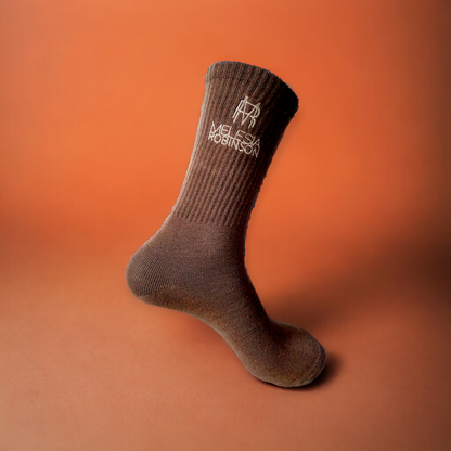 Calf-high knit stretch cotton-blend socks in beige. Logo embroidered at rib knit cuffs.