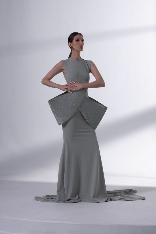 Structured tie-back dress is the epitome of elegant and sophisticated fashion. This dress combines classic tailoring with a contemporary twist, resulting in a versatile and stylish garment that's perfect for a range of occasions.
